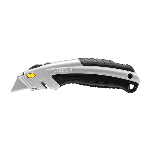 Photo of STANLEY 0-10-788 utility knife, silver and black, angled view, with yellow button and ergonomic grip.