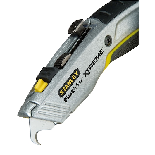 STANLEY 0-10-789 utility knife FatMax Xtreme, silver and black, angled close-up on white background.