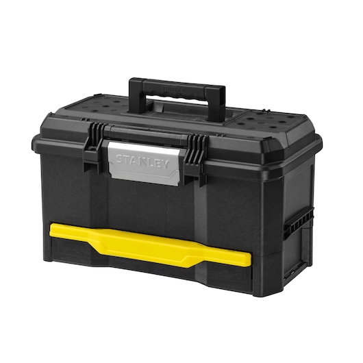 Photo of STANLEY 1-70-316 black toolbox with yellow latch, metal front plate, and top handle, angled on white background.