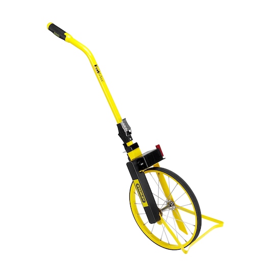 Stanley yellow measuring wheel with black accents for distance measurement, shown with upright handle.