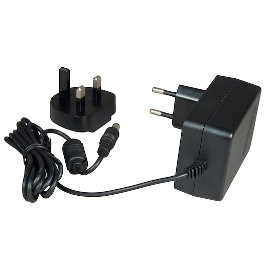 Black power adapter with cable and interchangeable plug attachments for UK and EU sockets.