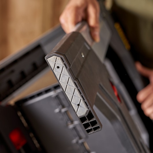 Photo of STANLEY 1-92-980 toolbox corner, showing reinforced plastic construction and textured grip.