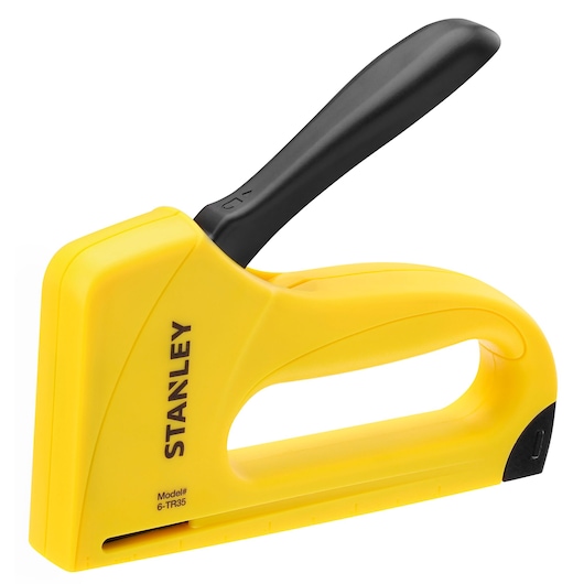 Photo of STANLEY 6-TR35 yellow manual staple gun, side angle, with black handle, photography category.