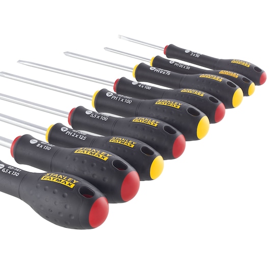 Set of eight STANLEY FATMAX screwdrivers with black handles, red and yellow ends, arranged in a row.