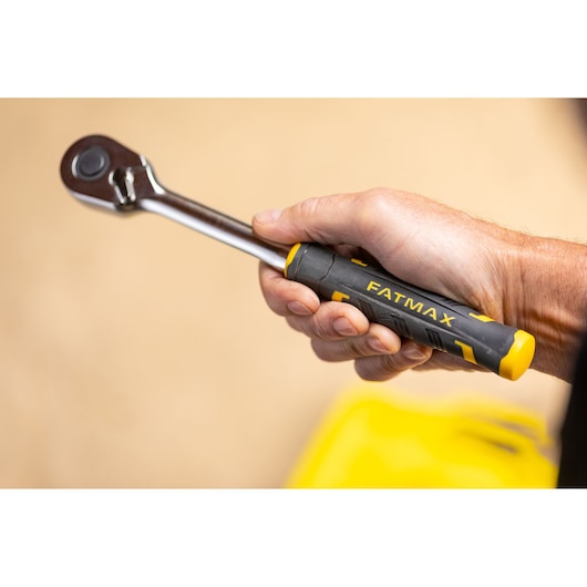 STANLEY FMMT82680-0 ratchet with black and yellow FATMAX handle, handheld, product photography.
