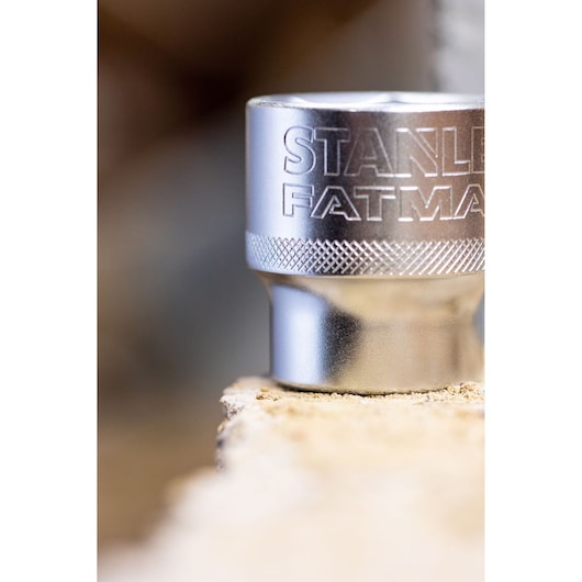 STANLEY FMMT82684-1 socket close-up, silver color, textured grip, photography of hand tool accessory.