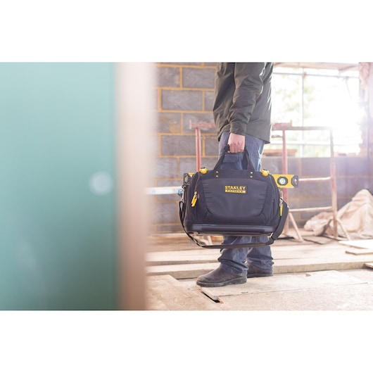 Photo of STANLEY FMST1-80147 tool bag carried on construction site.