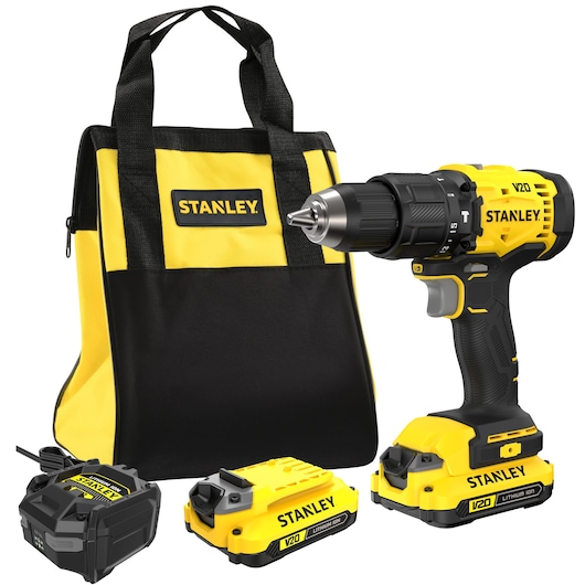 Stanley drill kit with tool bag, two batteries, and charger, all in yellow and black.