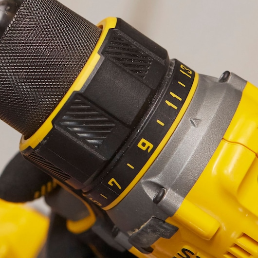 Close-up photo of STANLEY SFMCD720D2K cordless drill torque adjustment ring with yellow and black color.