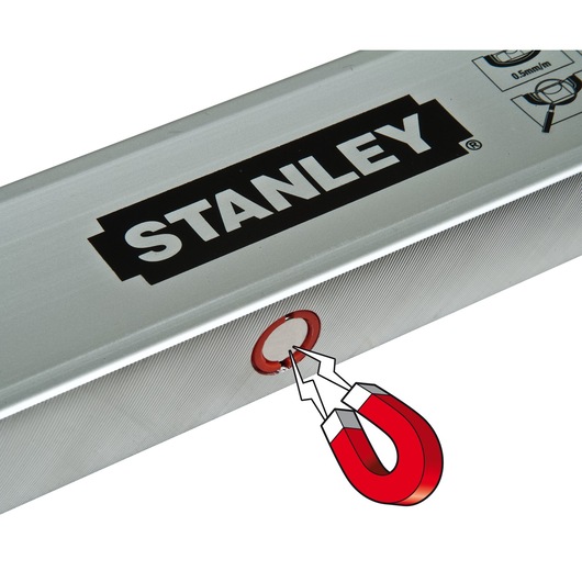 Photo of STANLEY STHT1-43111 level with visible magnetic feature, silver body, close-up angle.