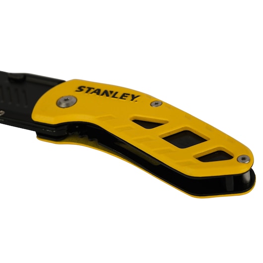 Photo of Stanley STHT10424-0 utility knife handle, yellow and black, product side view on white background.