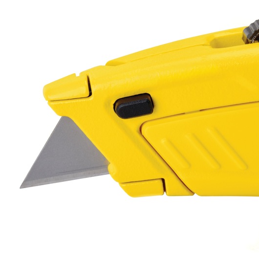 STANLEY STHT10430-0 utility knife angled view, yellow body with exposed blade and black button.