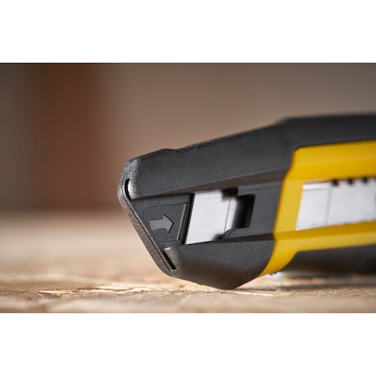 STANLEY STHT10501-0 utility knife close-up, showing black and yellow handle and blade slider.
