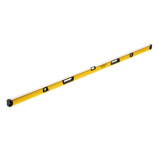 A long, yellow and silver spirit level with three bubble vials and two hand grips, used for measuring level surfaces. Brand: STANLEY.