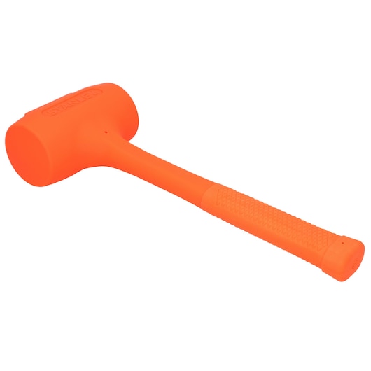 STANLEY STHT57534-0 orange rubber mallet with textured handle, side angle on white background.