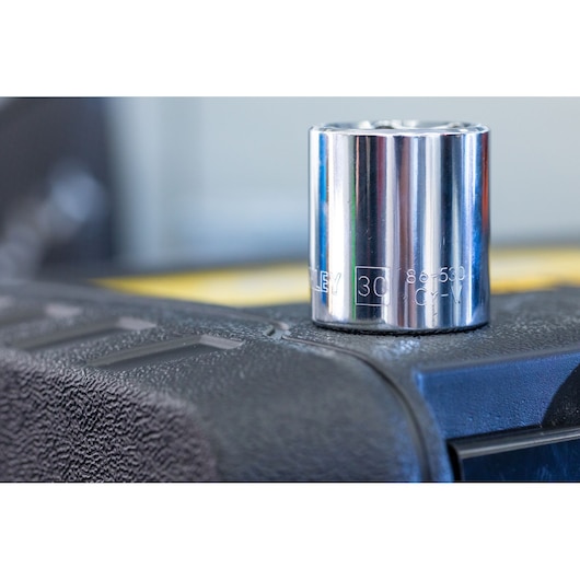 STANLEY STMT82666-0 chrome socket on black textured surface, close-up from front angle.
