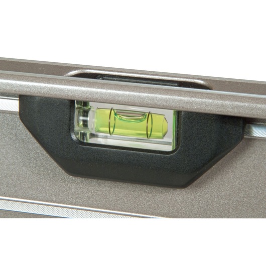 STANLEY XTHT1-42131 spirit level close-up, showing green vial and silver body on white background.
